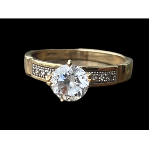 503 - 10k GOLD SOLITAIRE RING WITH STONE SET SHOULDERS SIZE R