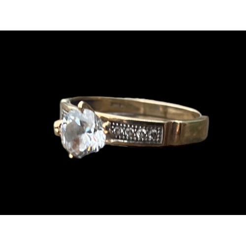 503 - 10k GOLD SOLITAIRE RING WITH STONE SET SHOULDERS SIZE R