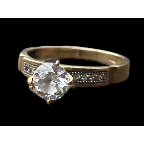 503 - 10k GOLD SOLITAIRE RING WITH STONE SET SHOULDERS SIZE R