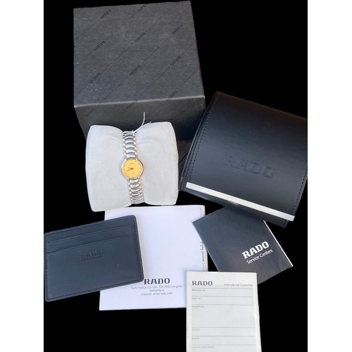 506 - A NEW RADO HDS QUARTZ IN BOX WITH PAPERS  IN STEEL AND GOLD