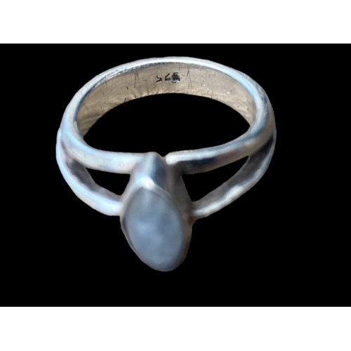 504A - A TRIPLE SILVER BAND MOONSTONE SET RING