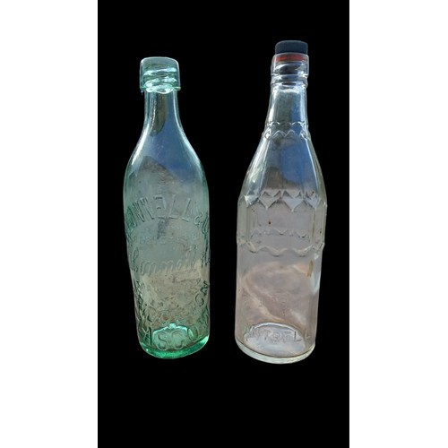 590 - 2 VINTAGE GLASS BOTTLES H.CONNELL & CO & COCHRANE LTD