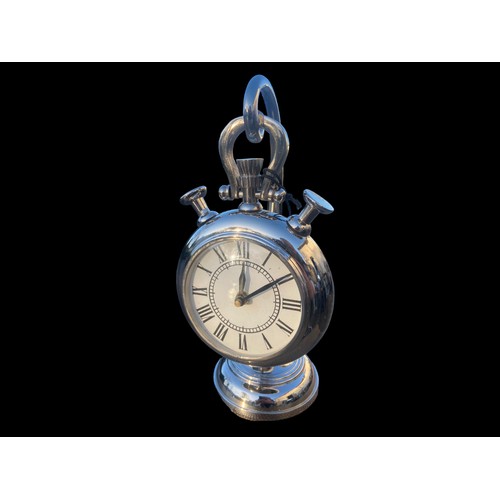 8 - A CHROME FINISHED CLOCK (AS POCKET WATCH) ON STAND