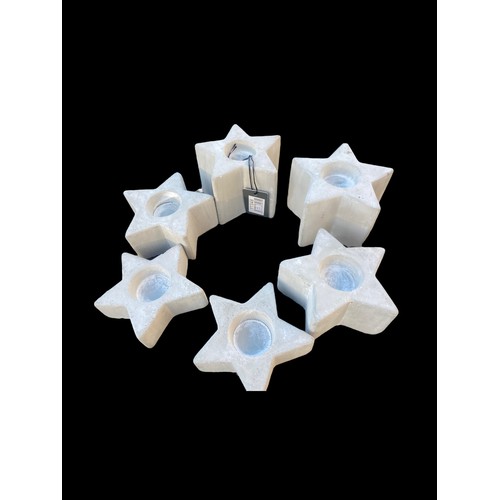 46 - A LOT OF 6 NEW TEALIGHT HOLDERS IN STONE AND HAVING A STAR SHAPE