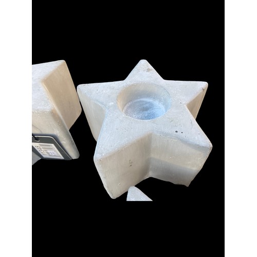 46 - A LOT OF 6 NEW TEALIGHT HOLDERS IN STONE AND HAVING A STAR SHAPE