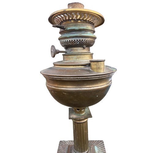 58 - A VINTAGE ORNATE BRASS OIL LAMP BASE