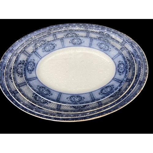 141 - 4 GRADUATED BLUE AND WHITE PLATTERS