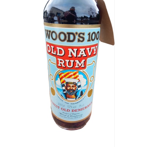 149 - 1980s WOODS 10 RUM 100cl  AND STRONG 57% PROOF