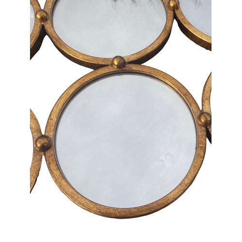 150 - A NEW 9 CIRCULAR PANEL GILT MIRROR