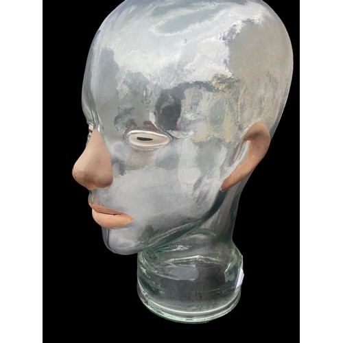 181 - AN ANTIQUE GLASS DISPLAY HEAD