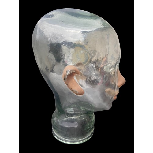 181 - AN ANTIQUE GLASS DISPLAY HEAD