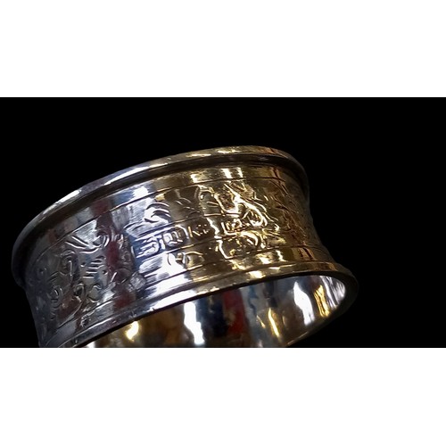 198 - A SILVER NAPKIN RING WEIGHS 8.57G