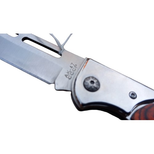 213 - AN AK-47 POCKET KNIFE