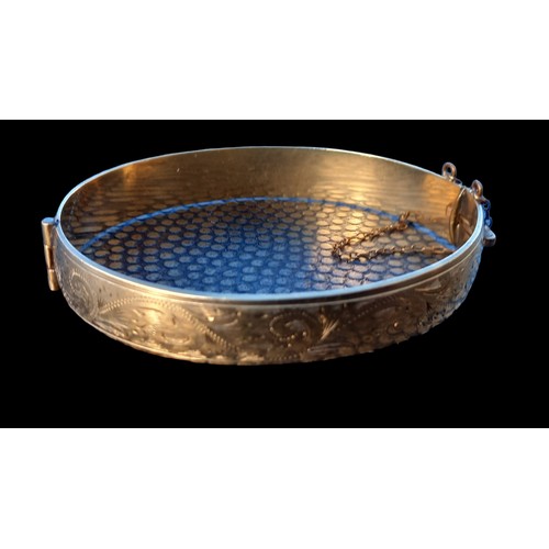 220 - ENGRAVED 9ct CORE METAL BANGLE