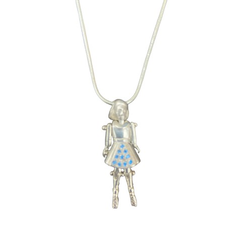 221 - AN ARTICULATED SILVER IRISH DANCER SET WITH BLUE STONES ON A SILVER CHAIN