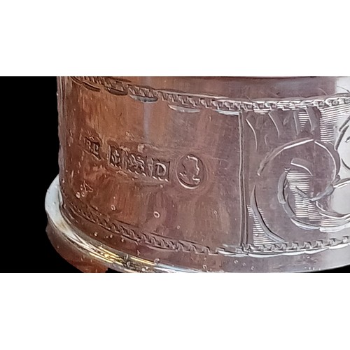 237 - AN ORNATE SILVER NAPKIN RING BIRMINGHAM DATED 1953 WITH CORONATION MARKS BY BISHTON'S LTD WEIGHS 23.... 