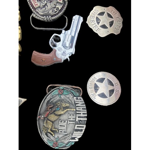 75 - A BOX OF QUALITY MIXED BELT BUCKLES & BADGES OF A WILD WEST THEME