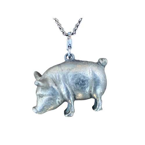 256 - A QUALITY PIG PENDANT ON A QUALITY SILVER CHAIN