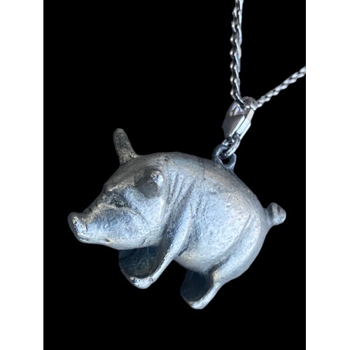 256 - A QUALITY PIG PENDANT ON A QUALITY SILVER CHAIN