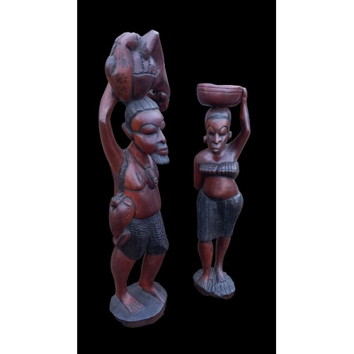 82 - TALL PAIR OF CARVED WOODEN FIGURES