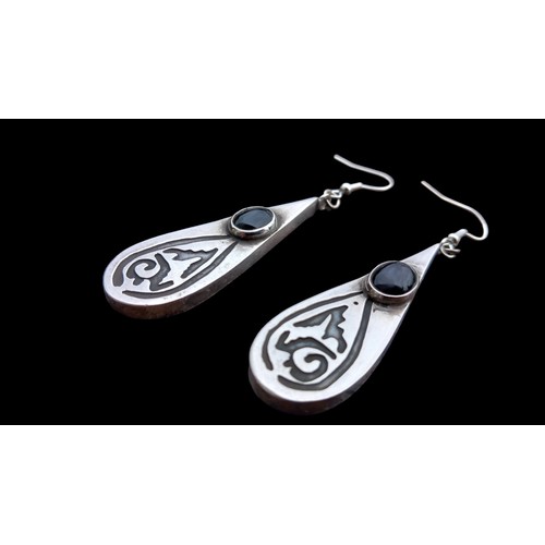 257 - A PAIR OF SILVER ONYX TEAR DROP EARRINGS