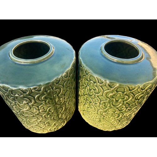 120 - A NEW PAIR OF GREEN GLAZED POTTERY VASE