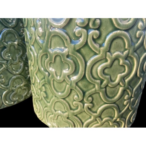 120 - A NEW PAIR OF GREEN GLAZED POTTERY VASE