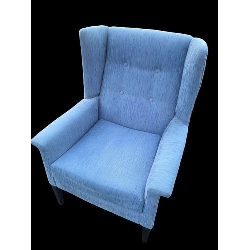 124 - A BLUE FABRIC WINGBACK ARMCHAIR