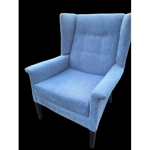 124 - A BLUE FABRIC WINGBACK ARMCHAIR