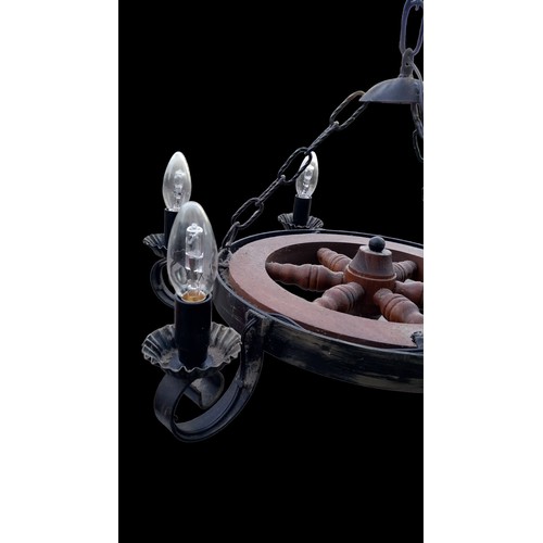 125 - A HANGING SHIPS WHEEL LIGHT FITTING