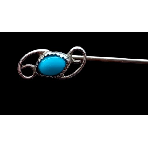 273 - A VINTAGE SILVER TURQUOISE STICK PIN