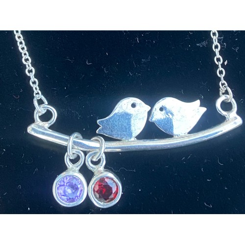 283 - A LARGE SILVER LOVE BIRDS NECKLACE SET WITH AMETHYST AND GARNET