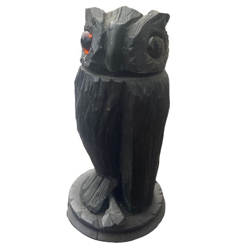 A BOG OAK ARTICULATED (HEAD MOVES) OWL WITH GLASS EYES