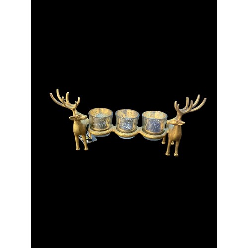 343 - A NEW BRASS FINISHED STAG TRIO CANDLE HOLDER