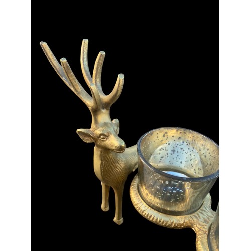 343 - A NEW BRASS FINISHED STAG TRIO CANDLE HOLDER