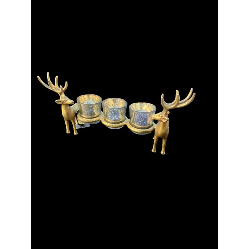 343 - A NEW BRASS FINISHED STAG TRIO CANDLE HOLDER