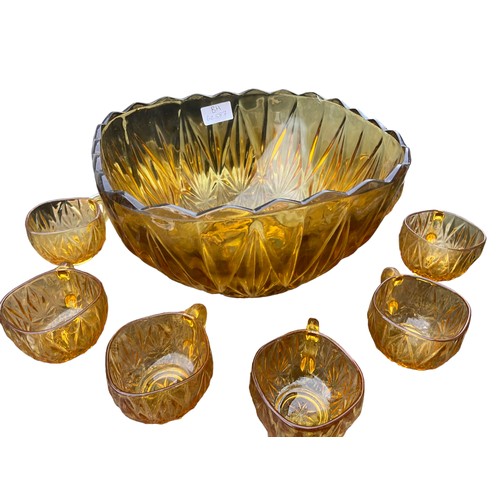 398 - AN AMBER GLASS PUNCH BOWL & MATCHING GLASSES