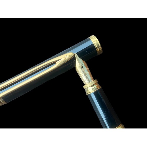 544 - A WATERMAN BLACK AN GOLD FOUNTAIN PEN