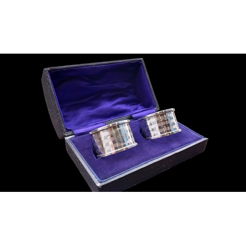 547 - A PAIR OF BIRMINGHAM SILVER NAPKIN RINGS IN A FITTED BOX WEIGHS 39.84GRAMS DATED  1921 BY GORHAM MAN... 