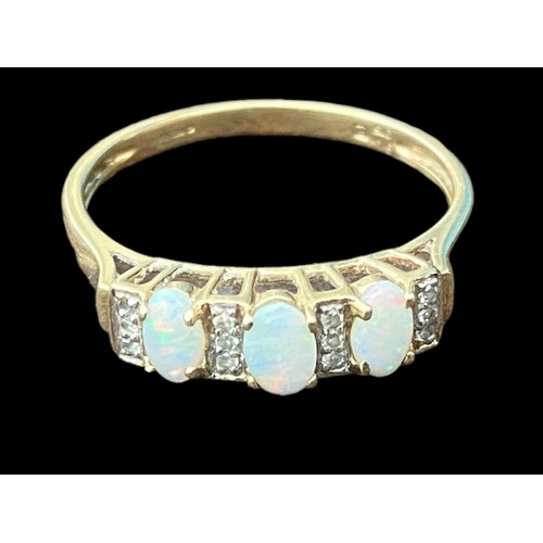 573 - A BEAUTIFUL 9ct GOLD OPAL AND DIAMOND RING -SET WITH 3 OVAL OPALS AND 12 DIAMONDS  SIZE T