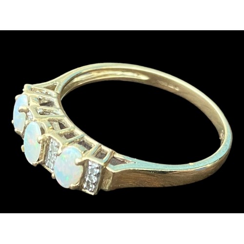 573 - A BEAUTIFUL 9ct GOLD OPAL AND DIAMOND RING -SET WITH 3 OVAL OPALS AND 12 DIAMONDS  SIZE T