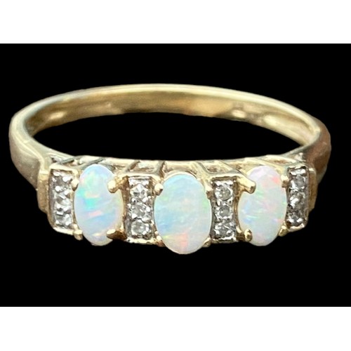 573 - A BEAUTIFUL 9ct GOLD OPAL AND DIAMOND RING -SET WITH 3 OVAL OPALS AND 12 DIAMONDS  SIZE T