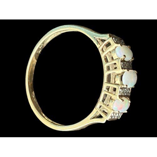 573 - A BEAUTIFUL 9ct GOLD OPAL AND DIAMOND RING -SET WITH 3 OVAL OPALS AND 12 DIAMONDS  SIZE T