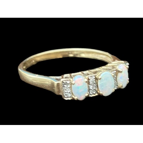 573 - A BEAUTIFUL 9ct GOLD OPAL AND DIAMOND RING -SET WITH 3 OVAL OPALS AND 12 DIAMONDS  SIZE T