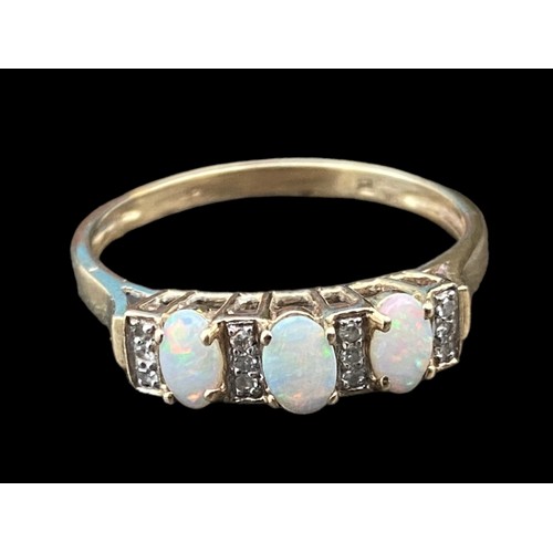 573 - A BEAUTIFUL 9ct GOLD OPAL AND DIAMOND RING -SET WITH 3 OVAL OPALS AND 12 DIAMONDS  SIZE T