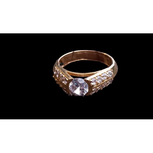 575 - A 14K (STAMPED) GOLD WHITE SAPPHIRE RING  SIZE