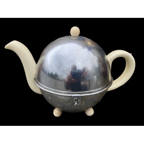 703 - CERAMIC TEAPOT WITH PLATED COVER