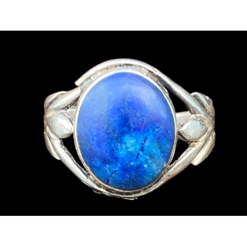 211A - AN ORNATE SILVER RING WITH A BLUE LAPIS STONE