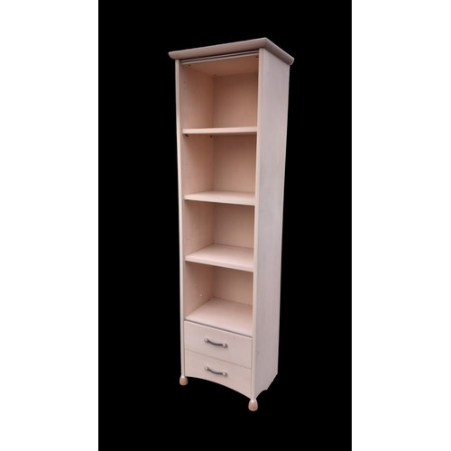 11 - A TALL BEECH NARROW SHELVING WITH DRAWERS TO THE BASE