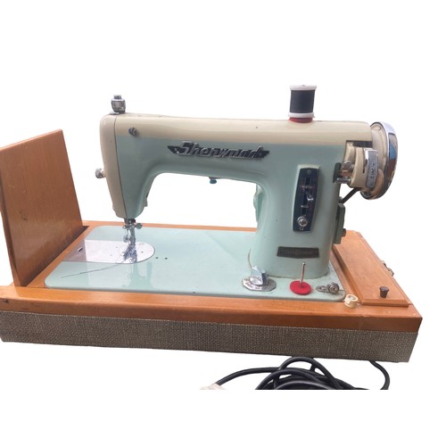 21 - A VINTAGE SEWING MAHINE IN A DUCKEGG BLUE FINISH BY SHERWOOD